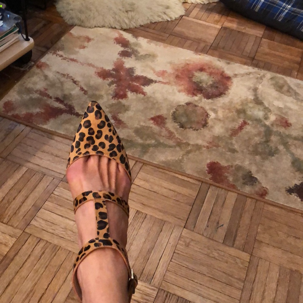 T-strap ankle kitten heels in leopard print .